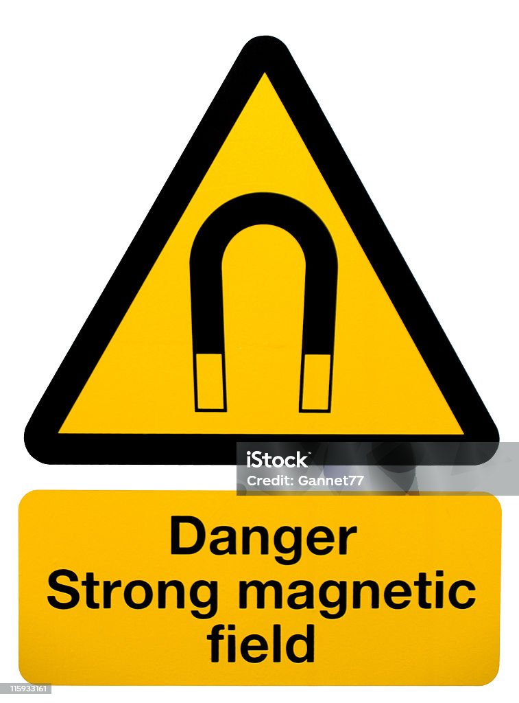 Magnetic Field Warning Sign Warning sign for presence of magnetic field, processed in PS to isolate on white background and burn colours in. Color Image Stock Photo