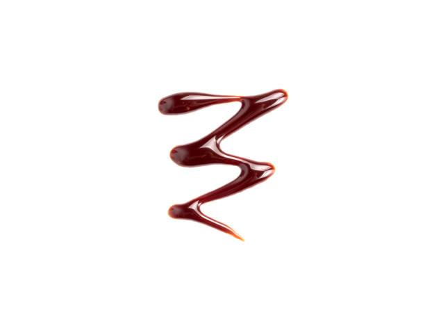 istock Chocolate sauce isolated on white background 1159333639