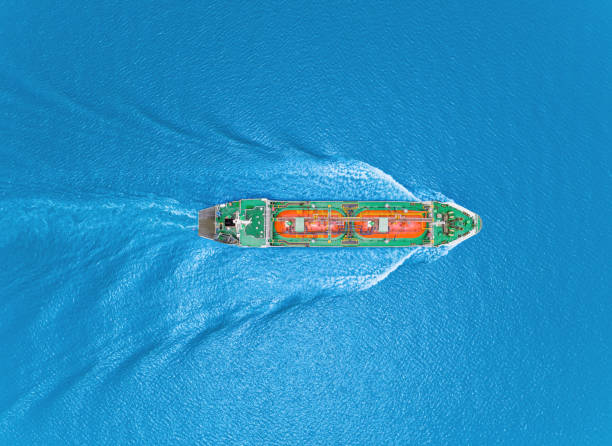 Aerial top view Oil ship tanker or LPG tanker transportation oil from refinery on the sea. Aerial top view Oil ship tanker or LPG tanker transportation oil from refinery on the sea. liquefied natural gas stock pictures, royalty-free photos & images