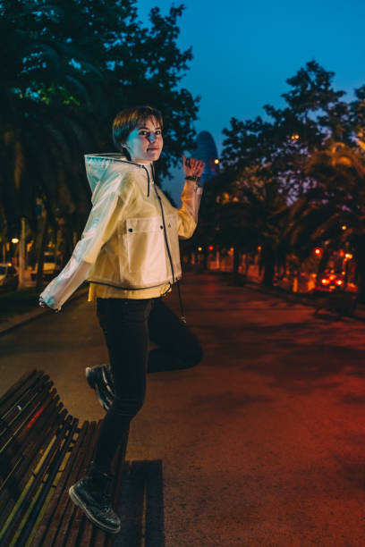 istock Young girl in Barcelona at twilight 1159334710