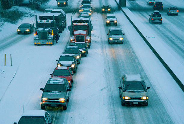 istock Blizzard at Rush Hour: People Traveling in Winter 115933741