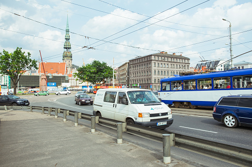 City Riga, Latvian Republic. City view from bridge. Way with cars and buildings. Travel photo 2019. 11. Jun.