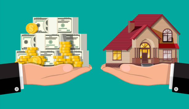 istock Hand scales with private house and money. 1159339115