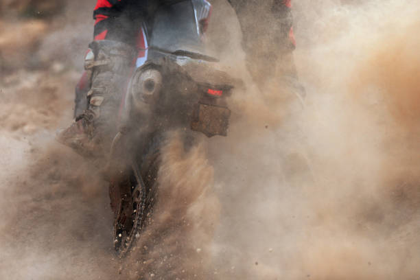istock Motocross racer accelerating speed in track 1159339475
