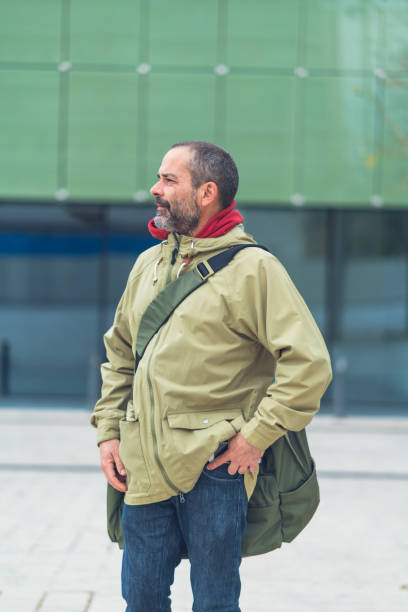 istock Middle aged man sightseeing in Barcelona 1159342065