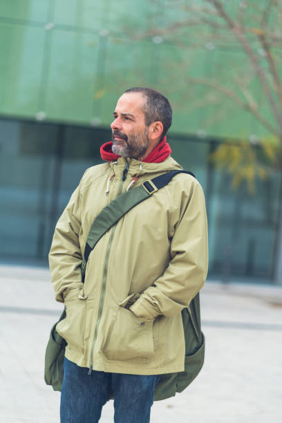 istock Middle aged man sightseeing in Barcelona 1159342068