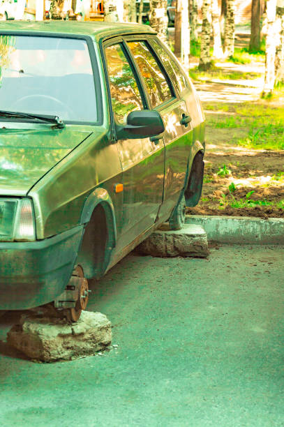 istock Old Russian car without wheels in the yard. 1159344347