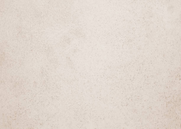 istock White pastel rough crack cement texture stone concrete,rock plastered stucco wall; painted flat fade background gray solid floor grain. 1159344360