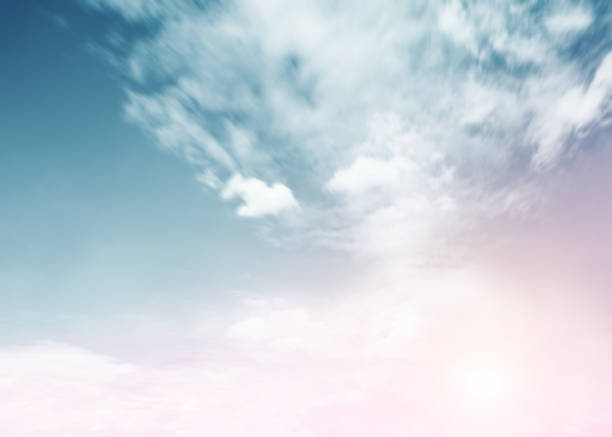 istock Cloud sky sunrise during morning background. Blue pastel heaven,soft focus lens flare sunlight. Abstract blurred white cyan gradient of peaceful nature. Open view windows beautiful summer spring 1159344773