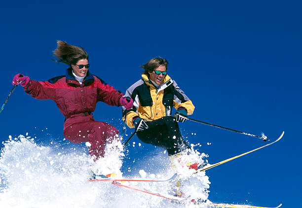 istock Couple Snow Skiing in Colorado 115934614