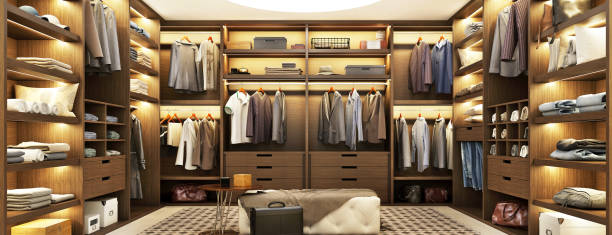 istock Large modern wardrobe with clothes with beautiful shelf lighting 1159347696