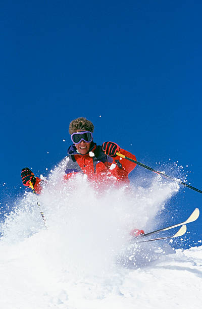 istock Snow Skier Against Blue Sky 115934782