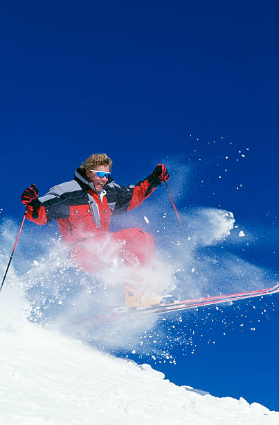 istock Snow Skier Blasting Through Fresh Powder 115934858