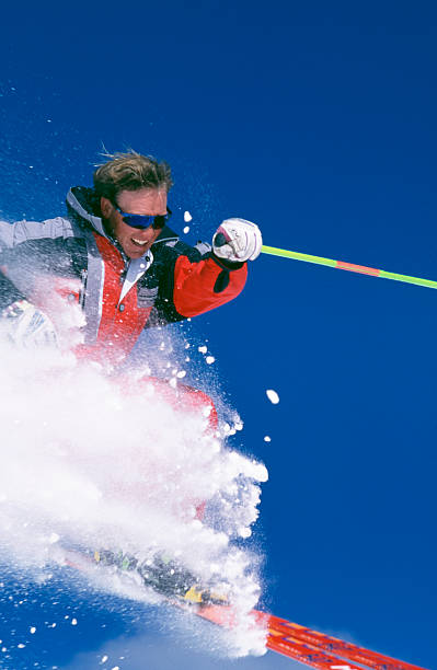 istock Snow Skier Blasting Through Fresh Powder 115934867