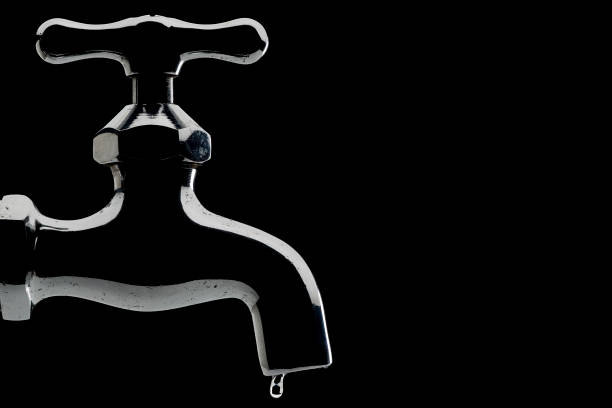 Leaky stylized chrome faucet.