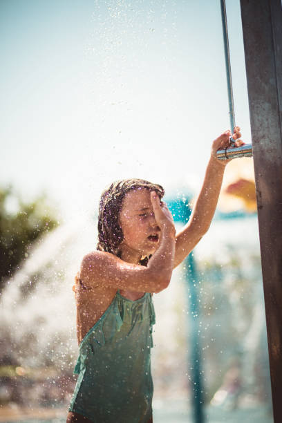 istock Mandatory showering after the pool. 1159355093