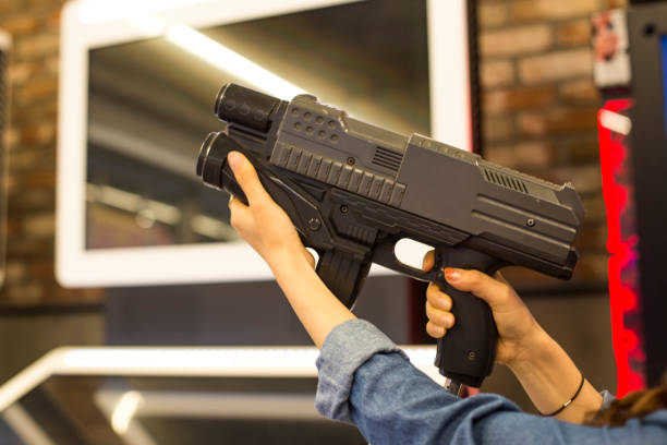 Toy laser gun made of plastic in hand