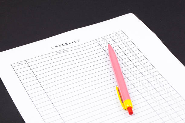 istock Checklist box with red checkmark, paper and a pen with checklist . 1159355806