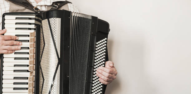 istock Accordionist plays retro accordion 1159356672