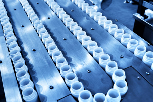 istock White Bottle Conveyor Belt at Production Line 1159357458