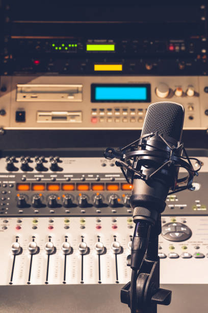 istock condenser microphone on audio mixing console and professional recording studio equipment background 1159358709