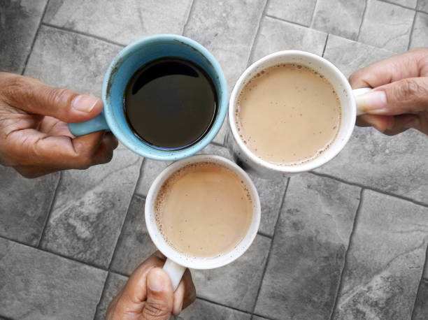 istock Coffee cheers. Toasting coffee with best friends. 1159359307