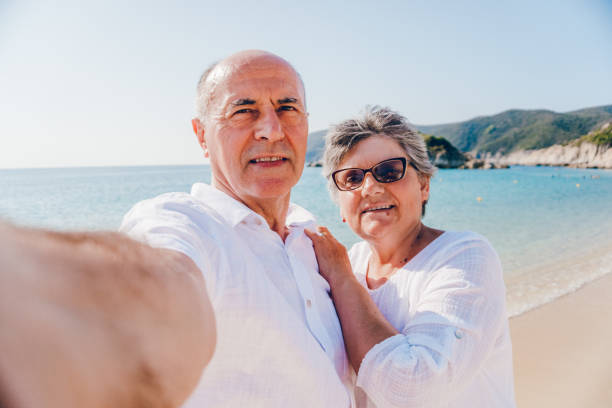 istock Senior selfies at the beach 1159360470