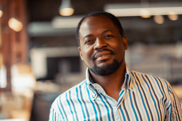 istock African-American man feeling excited before starting new project 1159365495