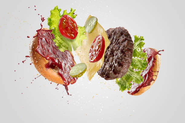 istock Burger's crashing isolated on white background 1159367424