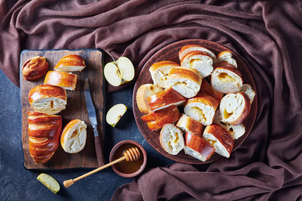 istock freshly baked yeast dough rolls with Apple filling 1159368134