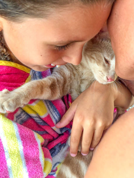 istock Little Girl Bonding With Her Cat on Vacations 1159368879