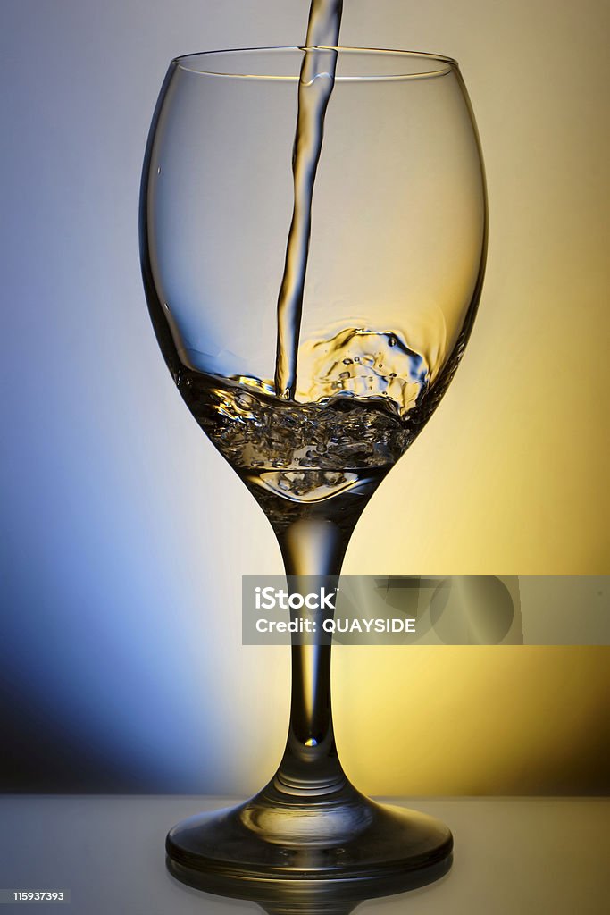 just pouring freshly poured glass of wine, water Alcohol - Drink Stock Photo