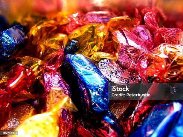 Sweets In Colourful Wrappers Stock Photo - Download Image Now - Candy, Wrapping Paper, Chocolate