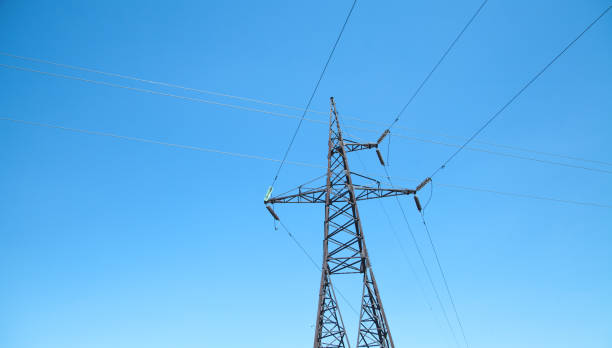 istock Power line at the blue sky. High voltage towers 1159375297
