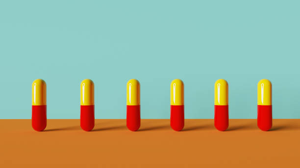 istock Medicine pills in a row 1159375394