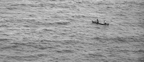 海の漁師 - catch of fish sport black and white activity ストックフォトと画像