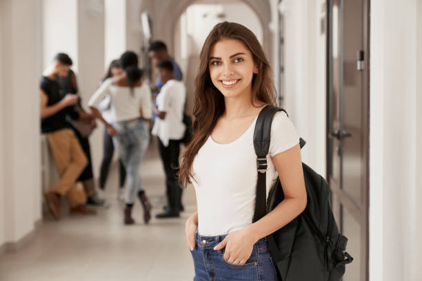 istock Positivity and happy female student with backpack. 1159375571