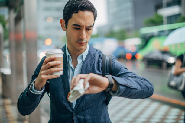 istock Young businessman checking the time 1159377053