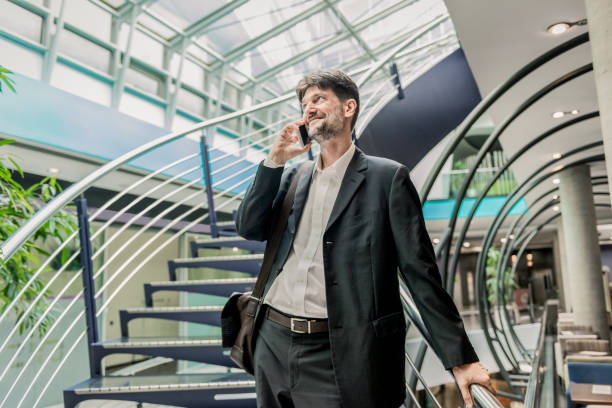 istock businessman talking on the phone 1159377099