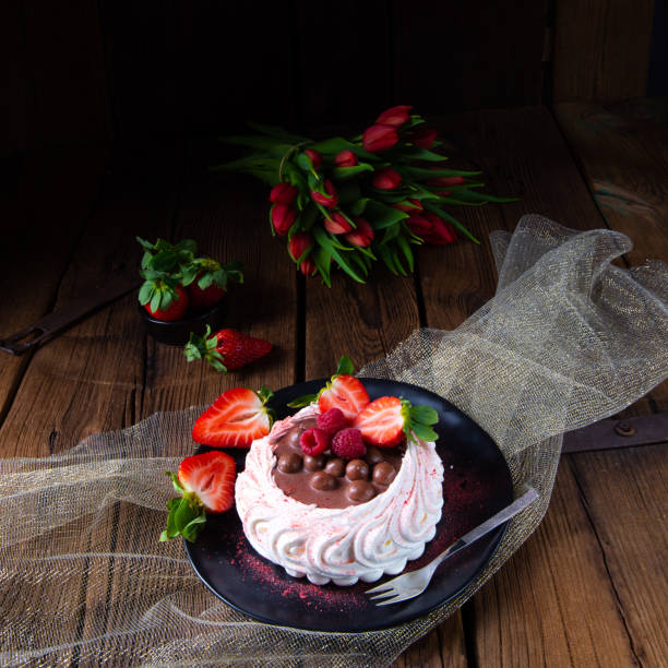 istock light pavlova with fresh fruits and chocolate 1159378369