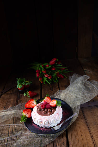 istock light pavlova with fresh fruits and chocolate 1159378500