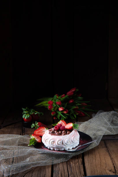 istock light pavlova with fresh fruits and chocolate 1159378682