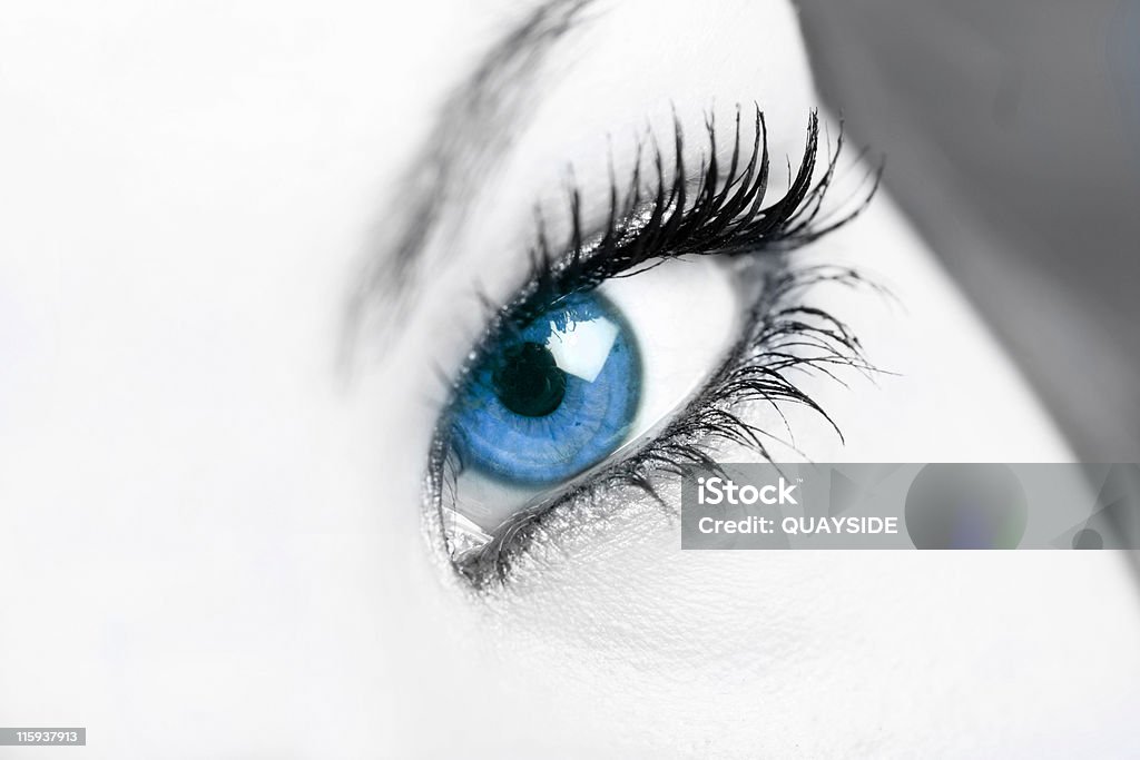 captivate selective color on blue eye Adolescence Stock Photo