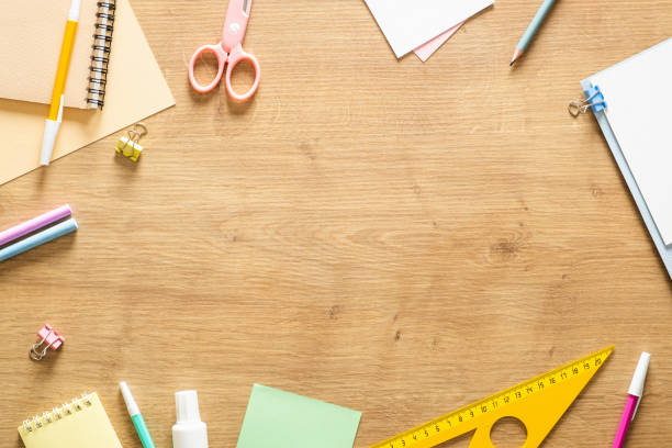 istock Flat lay school stationery on a wooden background. Back to school concept, creative layout. Top view, overhead. 1159380457