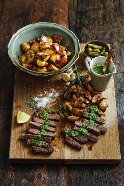 istock Kansas steak with fresh herb sauce and grilled vegetables 1159380508