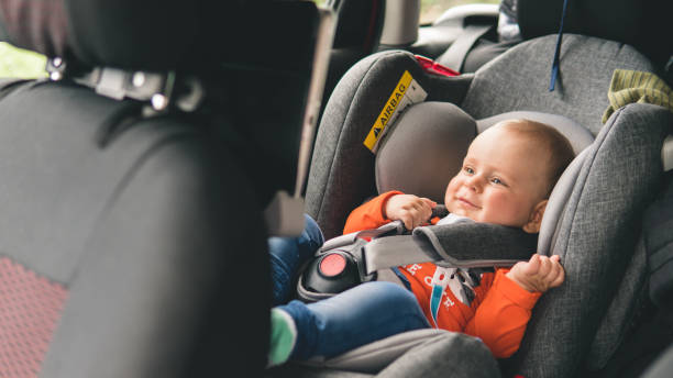 istock Baby sit in the car seat for safety. 1159380654