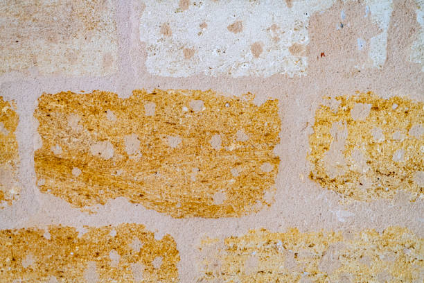 istock Bordeaux sandstone wall close-up 1159381675