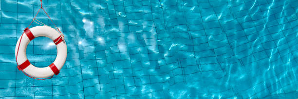 istock Lifebuoy swimming pool pano 1159381783