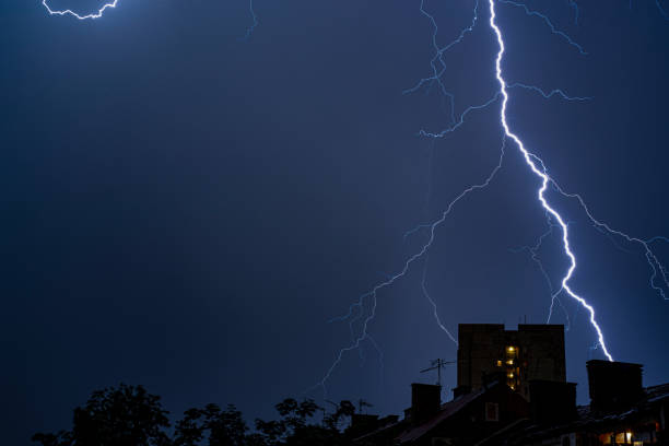 istock Tunder storm in the city 1159382169