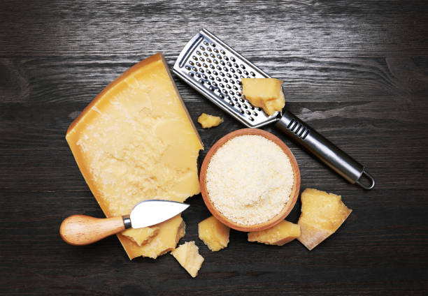 istock Parmesan cheese on wooden board 1159382848